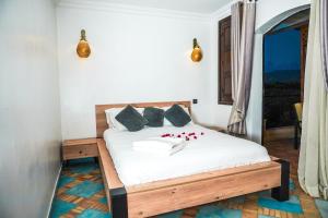 Postel nebo postele na pokoji v ubytování Villa Tifira