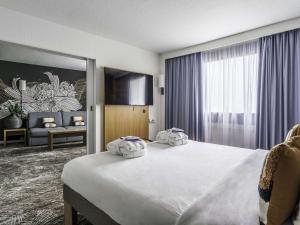 Postel nebo postele na pokoji v ubytování Novotel Paris Charenton le Pont