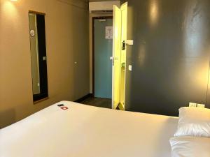 Postel nebo postele na pokoji v ubytování ibis Carlisle City Centre