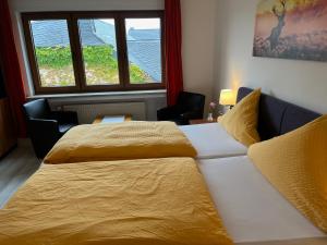 Billede fra billedgalleriet på Gasthaus Metzgerei Pension Maßem i Schillingen + 19 billeder