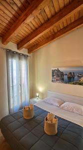 Postel nebo postele na pokoji v ubytování Domus Mea Apartments