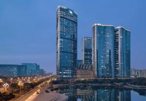 a view of a city with tall skyscrapers at Waldorf Astoria Chengdu in Chengdu