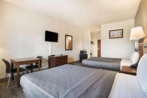 Postel nebo postele na pokoji v ubytování Econo Lodge