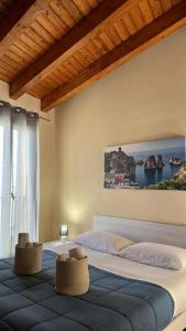 Postel nebo postele na pokoji v ubytování Domus Mea Apartments