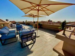 Un balcón o terraza en Appartement au centre de gueliz