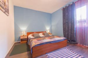 Postel nebo postele na pokoji v ubytování Tranquil Retreat Apartment Bozic