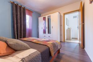 Postel nebo postele na pokoji v ubytování Tranquil Retreat Apartment Bozic