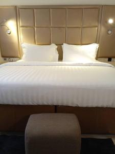 Letto o letti in una camera di Mulligan Hotel
