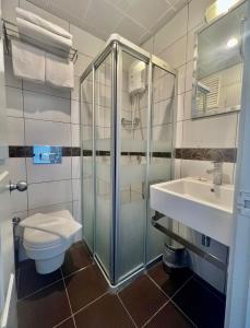 Koupelna v ubytování Carikci Hotel