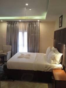 Letto o letti in una camera di Mulligan Hotel