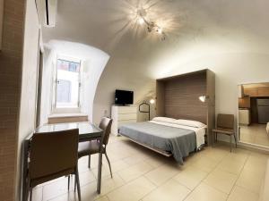 Postel nebo postele na pokoji v ubytování Apartment Maison Favola - Affitti Brevi Italia
