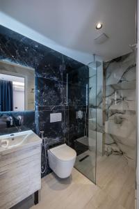 Koupelna v ubytování Hotel Vila Melina