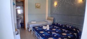 Postel nebo postele na pokoji v ubytování Una terrazza sul mare