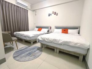 Postel nebo postele na pokoji v ubytování Ling Lai B&B + 10 fotografií