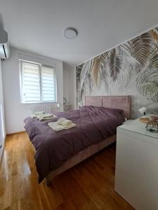 Postel nebo postele na pokoji v ubytování Apartman Iva