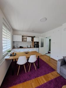 Kuchyň nebo kuchyňský kout v ubytování Apartman Iva