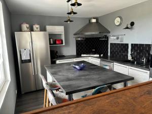 Dapur atau dapur kecil di Le Nid du Bois Rond