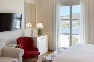 Cama ou camas em um quarto em Dorion Hotel
