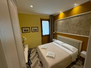 Posteľ alebo postele v izbe v ubytovaní B&B Fiorentino + 37 fotografií