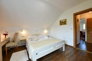 Postel nebo postele na pokoji v ubytování House Marija B&B