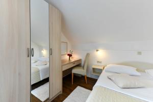 Postel nebo postele na pokoji v ubytování House Marija B&B
