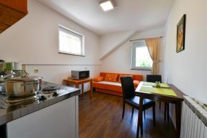 Kuchyň nebo kuchyňský kout v ubytování House Marija B&B