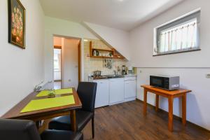 Kuchyň nebo kuchyňský kout v ubytování House Marija B&B