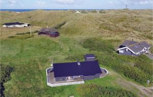 an overhead view of houses on a grassy hill at Holiday Home Klægdalen in Halkær