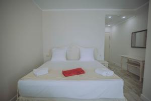 Postel nebo postele na pokoji v ubytování Royal Medis Hotel