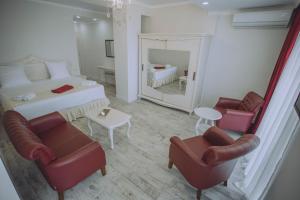 Postel nebo postele na pokoji v ubytování Royal Medis Hotel
