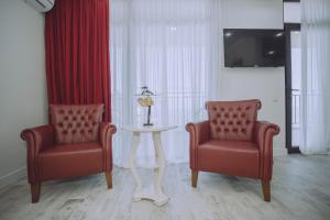 TV a/nebo společenská místnost v ubytování Royal Medis Hotel