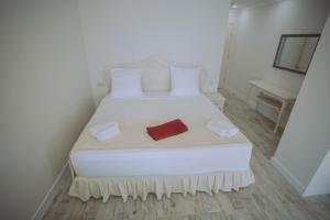 Postel nebo postele na pokoji v ubytování Royal Medis Hotel