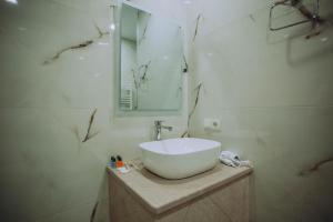 Koupelna v ubytování Royal Medis Hotel