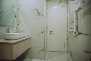 Koupelna v ubytování Royal Medis Hotel