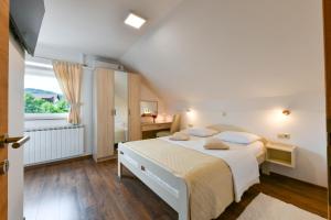 Postel nebo postele na pokoji v ubytování House Marija B&B