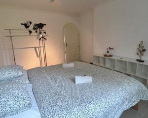 Letto o letti in una camera di Camere a "Casa Nostra"