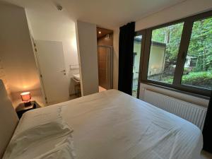 Letto o letti in una camera di Gite Fond des Vaulx