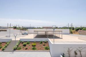 a view from the roof of a house with a table at Dimora Anna - Exclusive Sea Loft in Bari