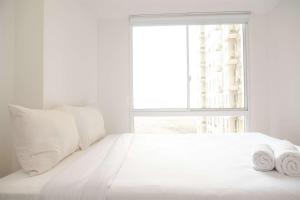 Gallery image of Well Furnished and Restful 2BR Tokyo Riverside PIK 2 Apartment By Travelio in Rawalembang