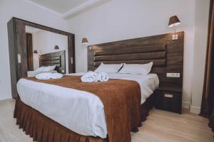 Postel nebo postele na pokoji v ubytování Royal Medis Hotel