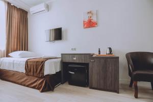 Postel nebo postele na pokoji v ubytování Royal Medis Hotel