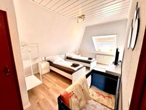 Postel nebo postele na pokoji v ubytování Loft 16 Weyhe - Self Check-In, Smart TVs, WLAN, kostenloser Parkplatz
