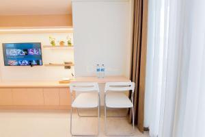 Fotografie z fotogalerie ubytování Fancy and Nice Studio Apartment Carstensz Residence By Travelio v destinaci Kampung Sawah