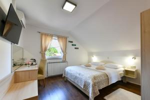 Postel nebo postele na pokoji v ubytování House Marija B&B