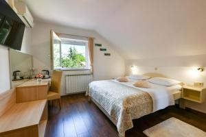 Postel nebo postele na pokoji v ubytování House Marija B&B