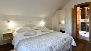 Postel nebo postele na pokoji v ubytování House Marija B&B