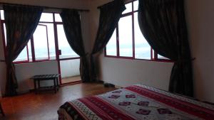 Postel nebo postele na pokoji v ubytování Ocean Reef Hotel