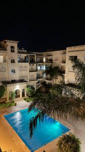 Πισίνα στο ή κοντά στο Appartement Avec Piscine à Fés