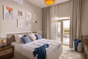 Postel nebo postele na pokoji v ubytování Marina 7 Resort By Seven Seasons + 72 fotografií