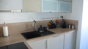 Kuchyň nebo kuchyňský kout v ubytování Chambre d'hôtes dans superbe toit terrasse